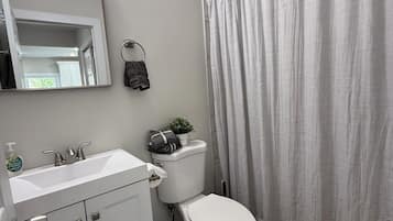 Hair dryer, towels, soap, shampoo