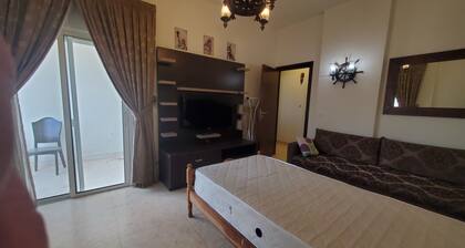 Calm 3-bedroom apartment with WiFi and AC in serene Mansourieh.