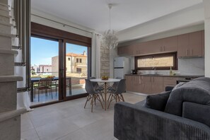 Two Story Suite with Two Bedrooms | Living area | 42-inch Smart TV with satellite channels