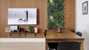 Luxury Apartment | Living room | 70-inch Smart TV with digital channels, Netflix, Hulu