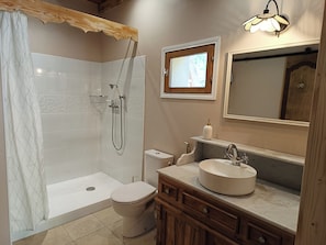 Shower, towels, soap, shampoo