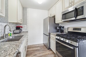 Condo, 2 Bedrooms | Private kitchen | Fridge, coffee/tea maker, toaster