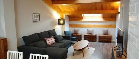 Apartment, City View | Living area | 22-inch Smart TV with digital channels