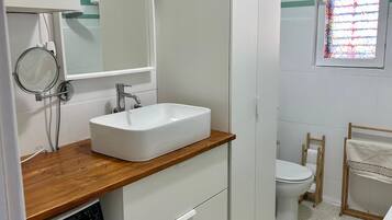 Hair dryer, towels, soap, toilet paper