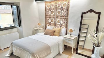 Casa | 1 dormitori, planxa i posts de planxar, wifi gratuïta i roba de llit