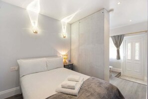1 habitación, tabla de planchar con plancha, internet y ropa de cama 