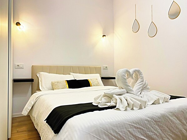 1 غرفة نوم ومكواة/لوح كي وواي فاي مجانًا وملاءات أسرّة