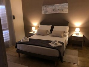 Comfort Apartment, 2 Bedrooms, Balcony, Partial Sea View | Blackout drapes