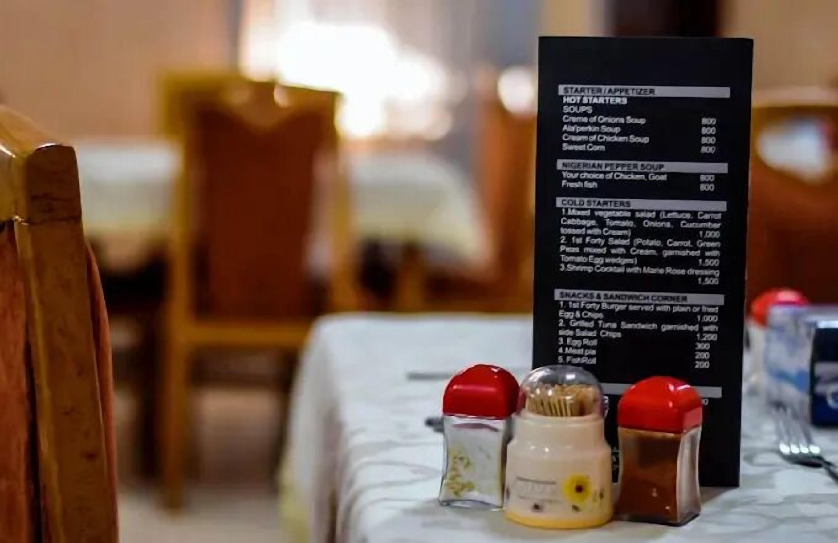 A restaurant menu with various food categories and prices.