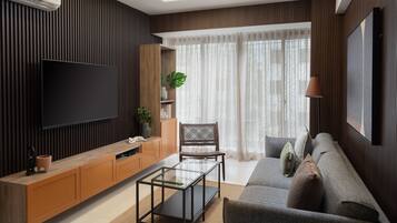 Apartamento Deluxe | Zona de estar