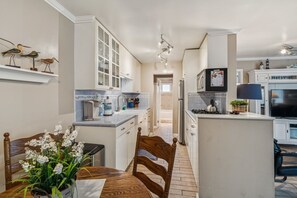 Fridge, microwave, coffee/tea maker, toaster