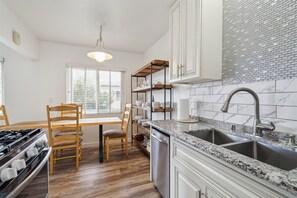 Fridge, microwave, dishwasher, coffee/tea maker