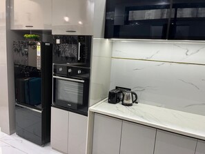 Fridge, microwave, oven, stovetop