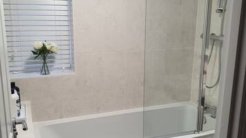 Shower, towels, soap, shampoo