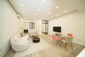 Signature Condo, 2 Bedrooms, Non Smoking, Kitchen | Living room | 30-inch Smart TV with digital channels - Luxury 2BR apartment in the center (Yerevan)