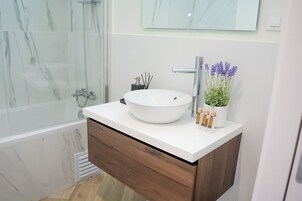 6 - Twin Room, City View | Bathroom | Eco-friendly toiletries, hair dryer, bathrobes, slippers