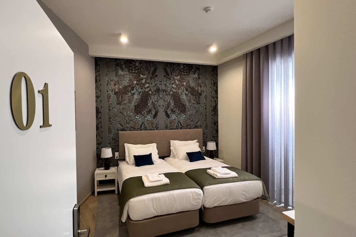 1 - Twin Room, City View | Soundproofing, WiFi (free), individually decorated, bed sheets