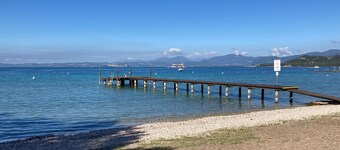 Luxurious lakeside apartment, private beach, lake view terrace