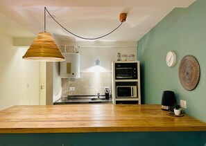 Microwave, oven, cookware/dishes/utensils