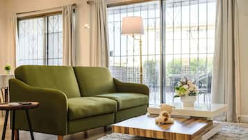 Apartment, Multiple Beds, Patio, Garden View (1179 Monterey Park) | Living area | 42-inch flat-screen TV with digital channels