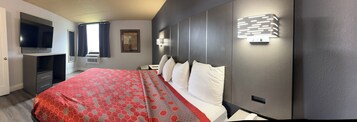 Room, 1 King Bed, Non Smoking | Desk, laptop workspace, blackout drapes, iron/ironing board