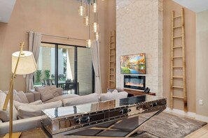 Townhome, Multiple Beds, Patio, Garden View (7580BD MVV) | Living area | 42-inch flat-screen TV with digital channels