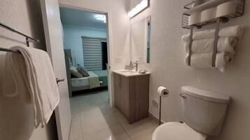 Shower, hair dryer, towels, soap