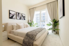 2 chambres, coffre-fort, fer et planche à repasser