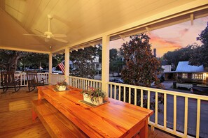 Outdoor dining - Old Village Luxury – Historic 5BR, Walk to Dining, Shops, & Sunset Views (Mount Pleasant)