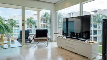 Deluxe Condo, Ocean View | Living area | 50-inch Smart TV with digital channels, Netflix, streaming services