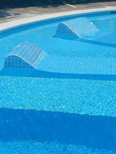 A home with a family-friendly atmosphere, close to the beach, shops, and the airport.
