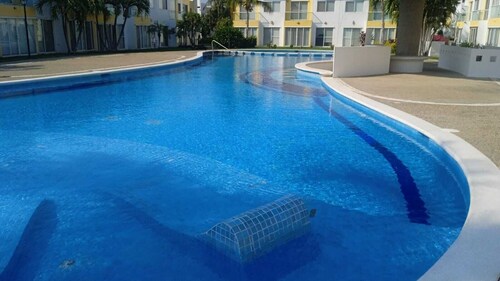 Family house, close to the beach, stores and the airport.
