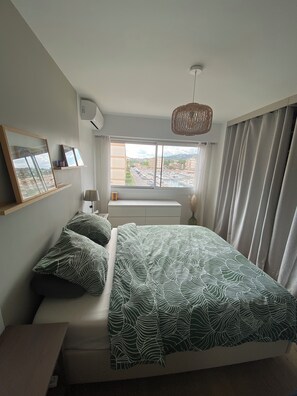 2 habitaciones, tabla de planchar con plancha, wifi y ropa de cama