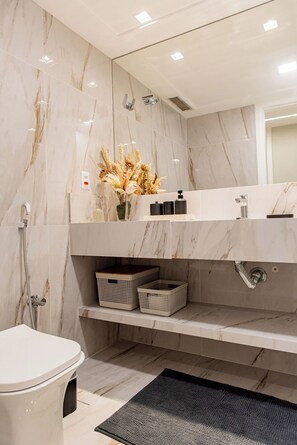 Shower, hair dryer, towels, soap