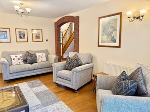 TV, fireplace, books, offices