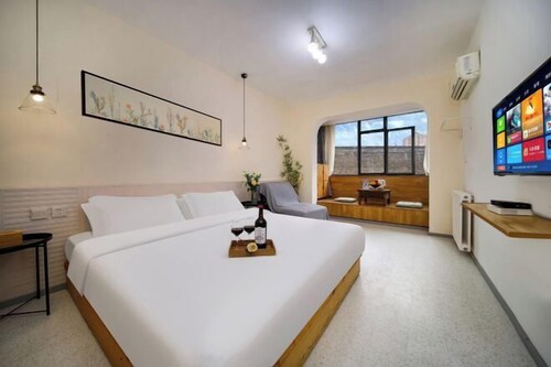 Yuecheng Washe Travelling Hotel (Xi'an Bell and Drum Tower South Gate)