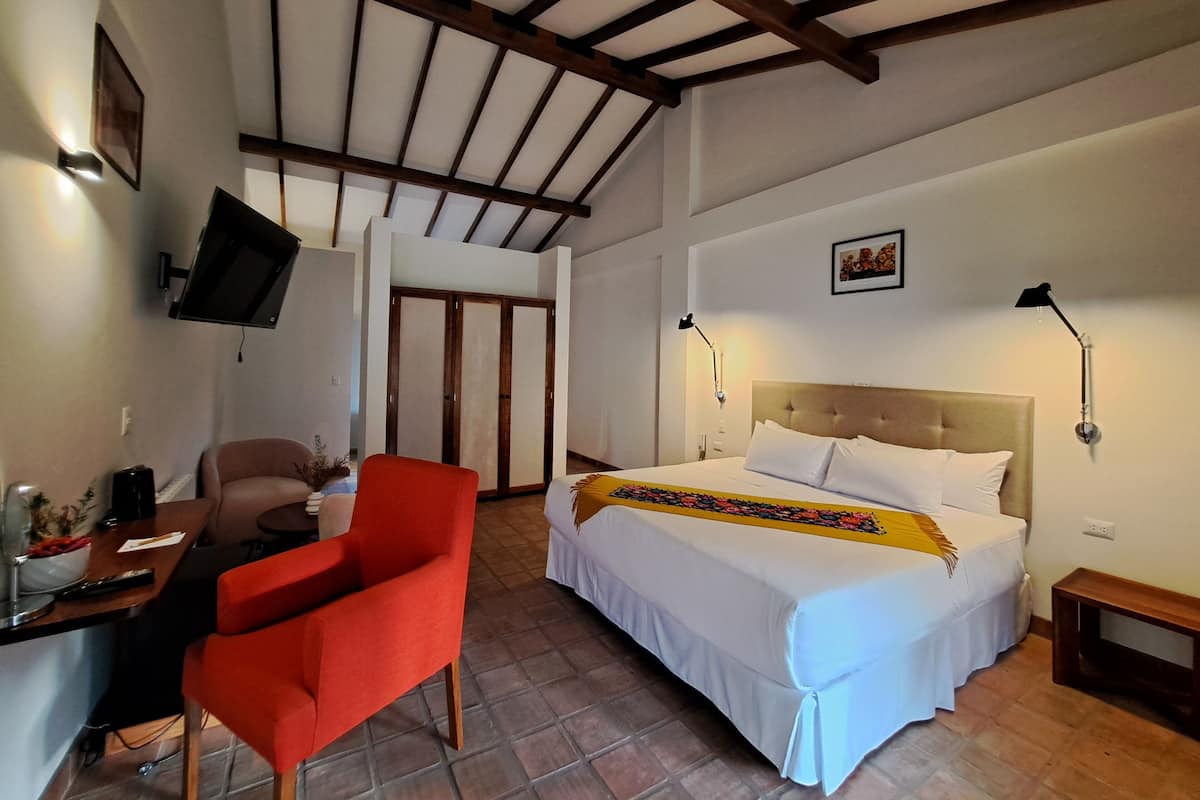 Deluxe Double Room, 1 Queen Bed, Garden View | In-room safe, blackout drapes, iron/ironing board, free WiFi