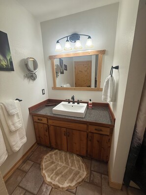 Hair dryer, towels, soap, toilet paper