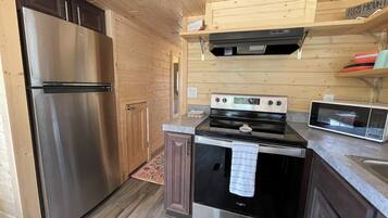 Family Cottage | Private kitchen | Fridge, coffee/tea maker