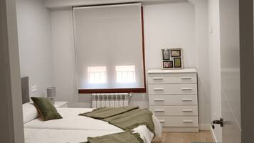 2 dormitorios, tabla de planchar con plancha, wifi gratis y ropa de cama