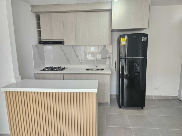 Private kitchen - Beautiful air-conditioned apartment with a beautiful city view (Valledupar)