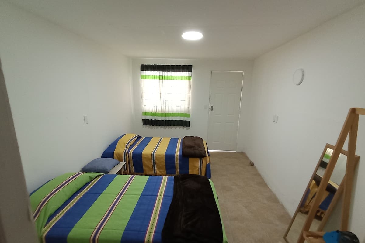 Twin Room, Garden View | Iron/ironing board, free WiFi