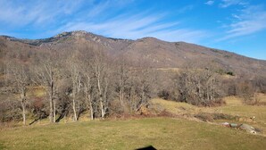 A mountainous landscape with a clear sky.
