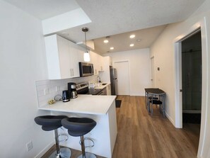 Fridge, microwave, oven, stovetop - Very bright walkout basement Close to Mountains (Cochrane)