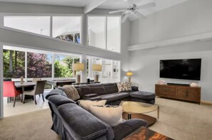 Smart TV, fireplace, books, printers