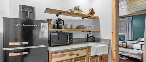 Fridge, microwave, stovetop, coffee/tea maker