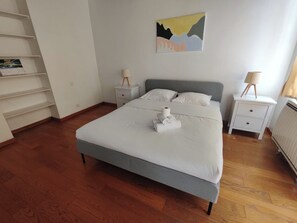 1 bedroom, desk, iron/ironing board, travel crib