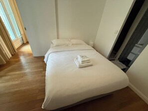 1 bedroom, desk, iron/ironing board, travel cot