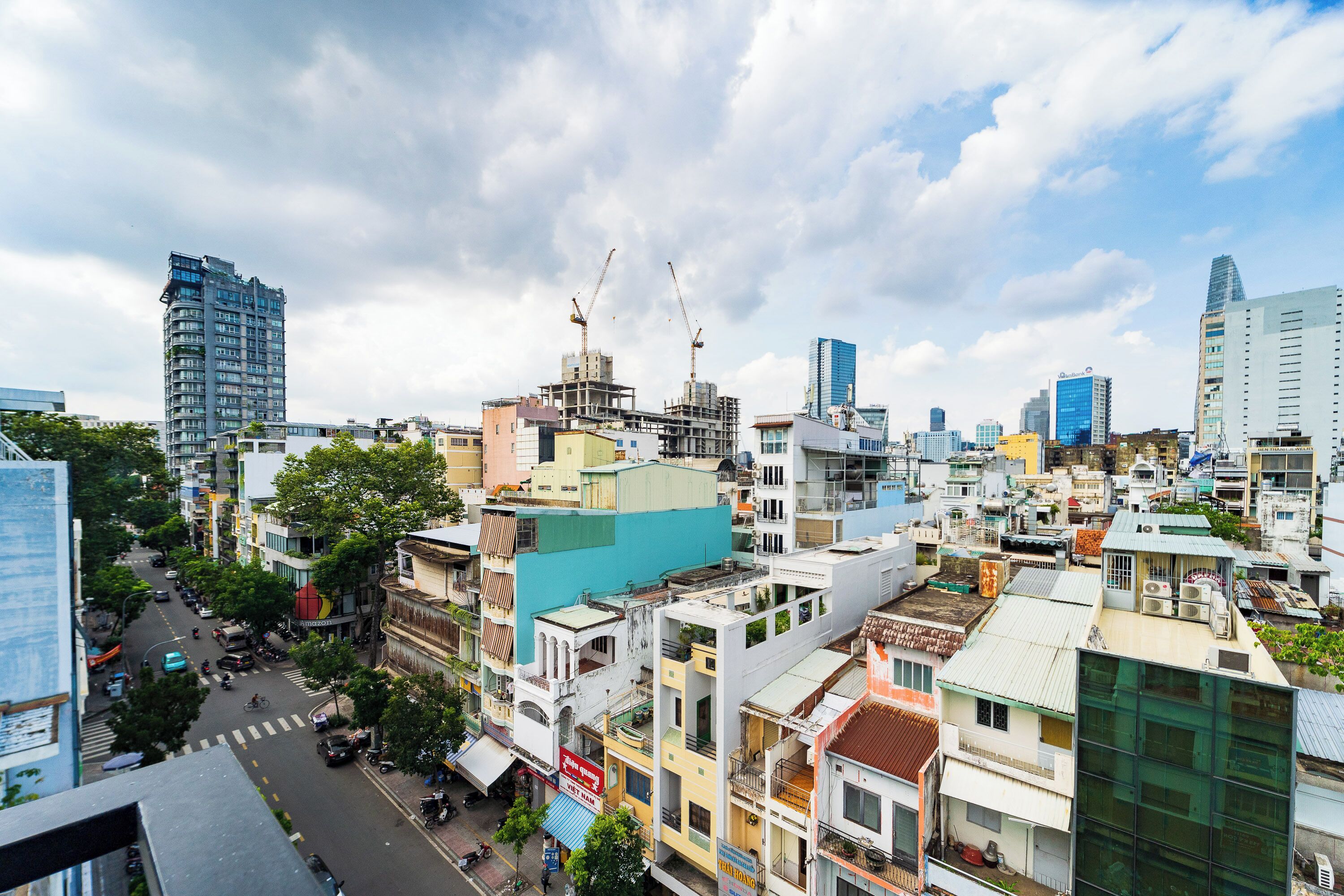 A densely packed urban area with various buildings, including a mix of residential and commercial structures.