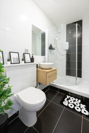 Hair dryer, towels, shampoo